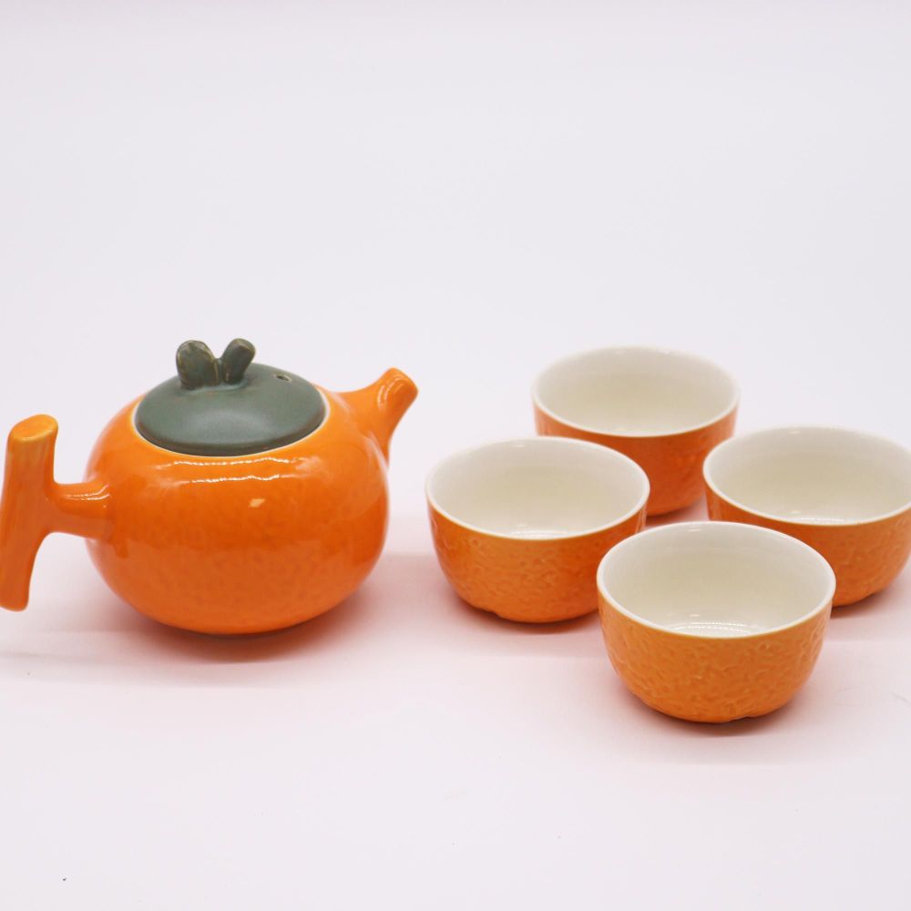 Originelles Teeset in Orange-Optik – Teekanne inkl. 4 Tassen - aus Keramik